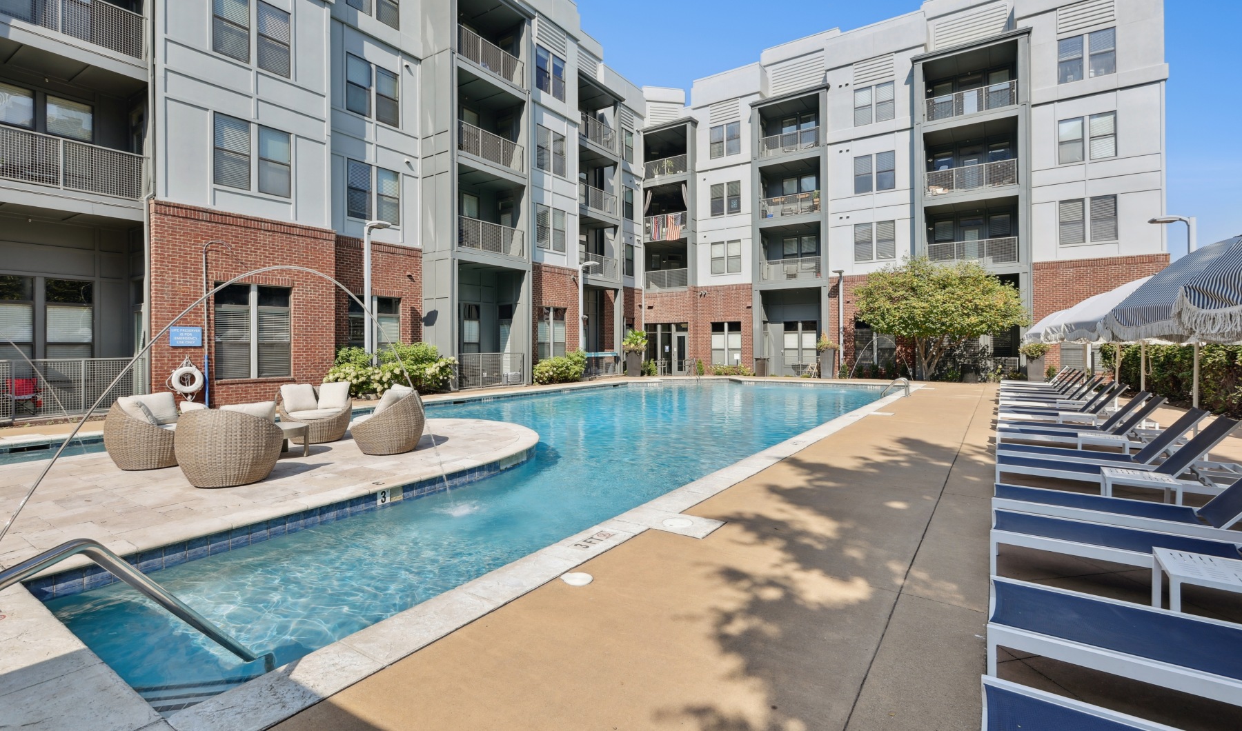 swimming pool with lounge chairs